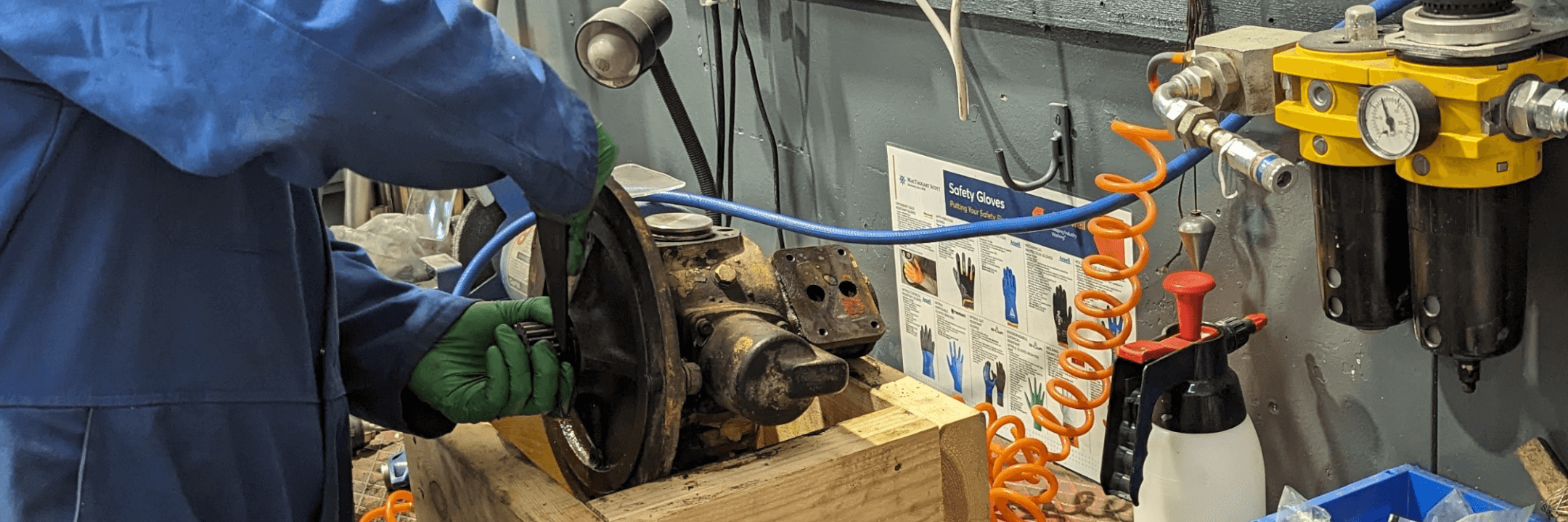 Landscape of Technician repairing an air motor